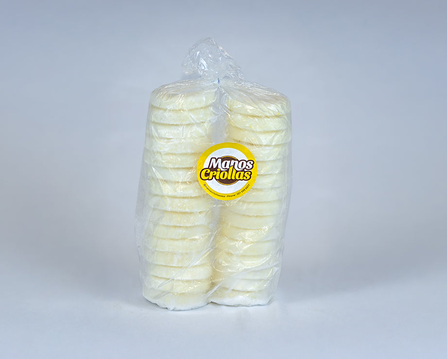 Manos Criollas frozen white corn arepas, pack of 30, pure corn 90-gram arepas sealed in a clear bag